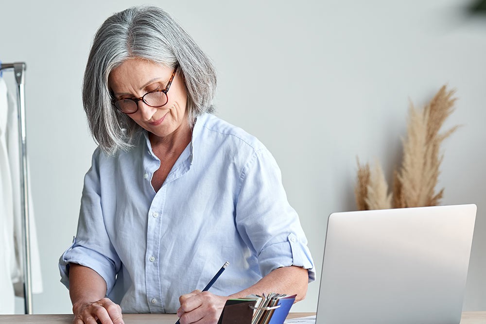 A person writing.