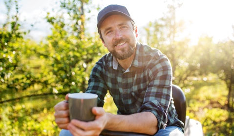 A man drinking coffee.