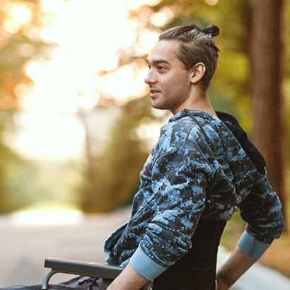 A man in a wheelchair.