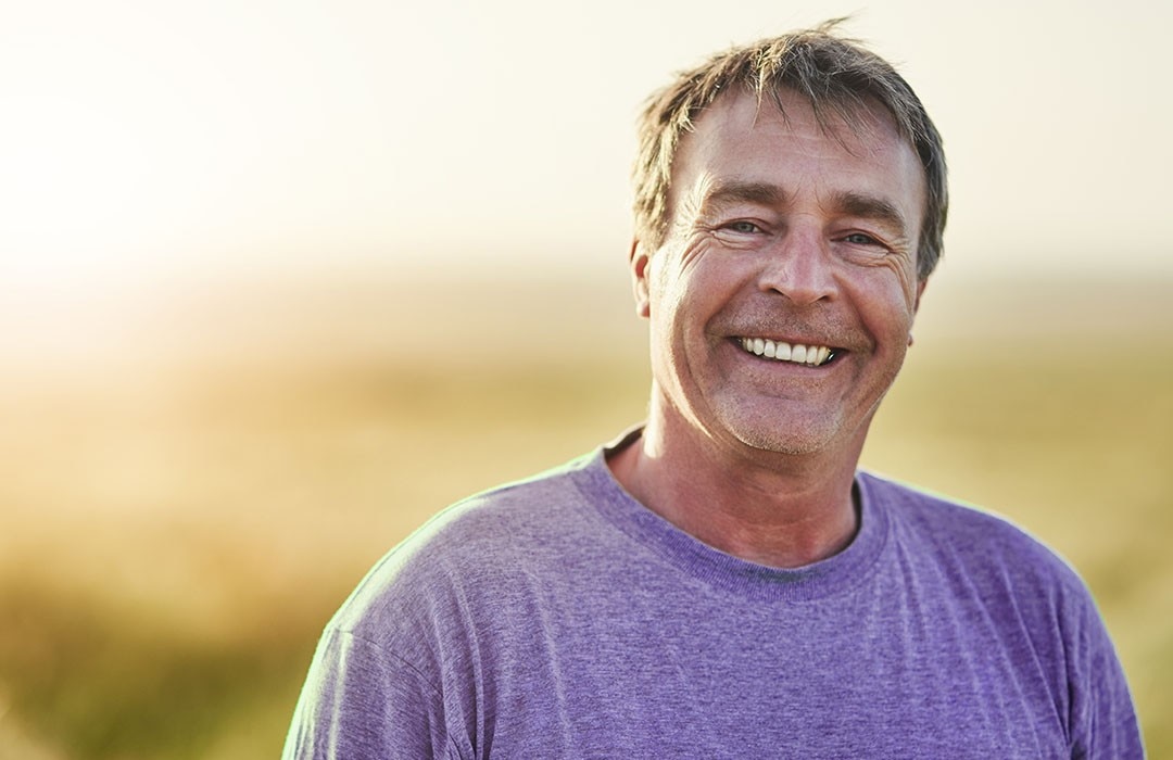 A man smiling.