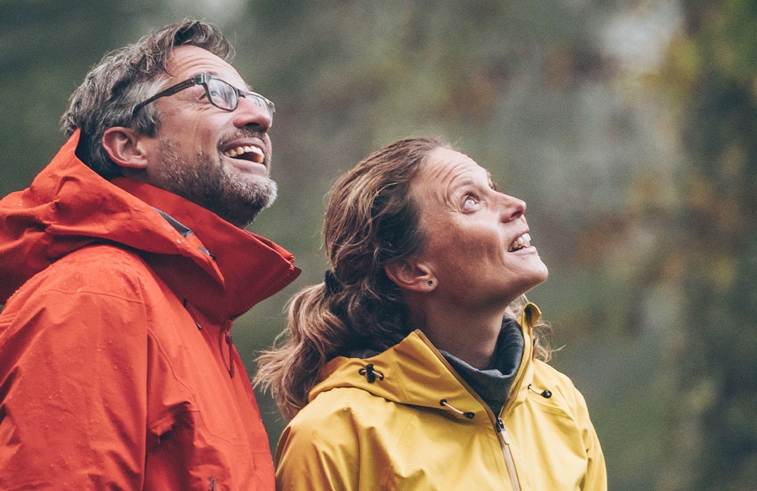 A couple hiking in the forest.